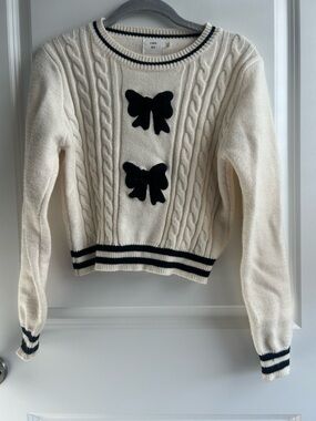 Luna Ivory Cable-Knit Crew Sweater with Black Bow Details